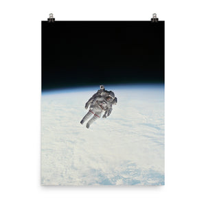 NASA Astronaut Robert Stewart above Earth Poster